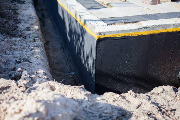 Professional Waterproofing technician working in Bellbrook, OH